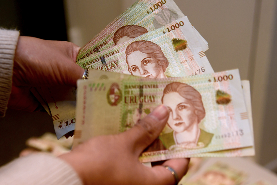 Cotizaciones de divisas en un mercado financiero. Foto: Clarín